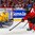 BUFFALO, NEW YORK - JANUARY 5: Canada's Sam Steel #23 battles for the loose puck in front of Sweden's Filip Gustavsson #30 during the gold medal game of the 2018 IIHF World Junior Championship. (Photo by Andrea Cardin/HHOF-IIHF Images)

